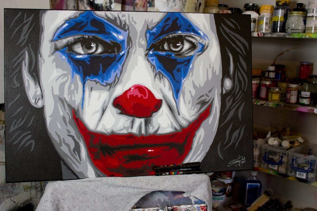joker painting, Joaquin Phoenix painting on easel