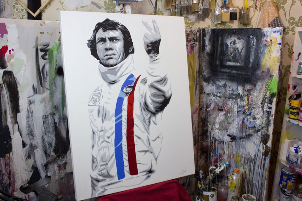 le mans steve mcqueen painting on a easel