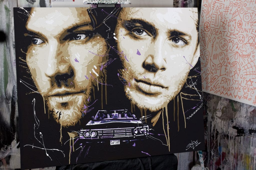 supernatural painting on a easel in a art studio